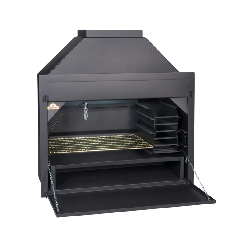 A black build-in braai fireplace with a full length braai grid, embermaker, ash pan, potjie hook, and light fitting. The image shows the top and bottom door of the unit.