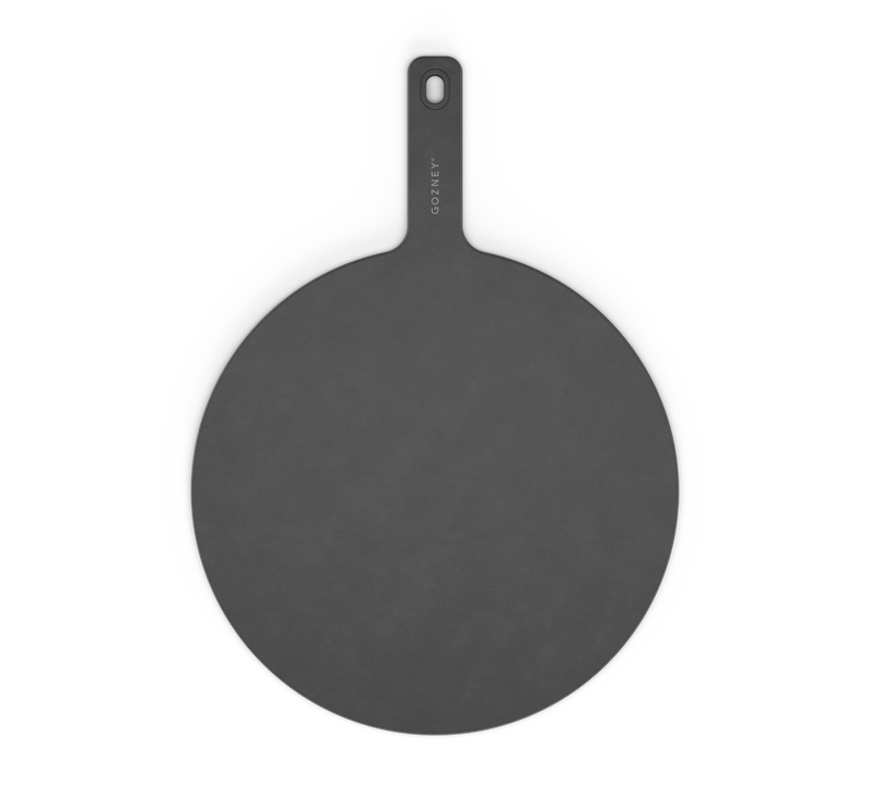 Black round pizza stone with handle on a white background