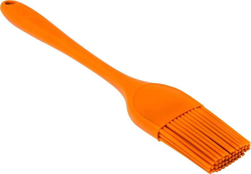 Orange silicone basting brush on a white background