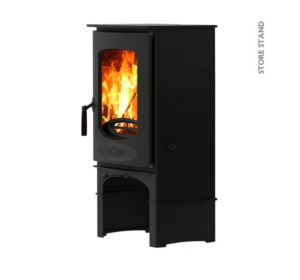 A black Charnwood C-Eight multi-fuel fireplace with a visible flame, standing on a Schott Robax Glass base.