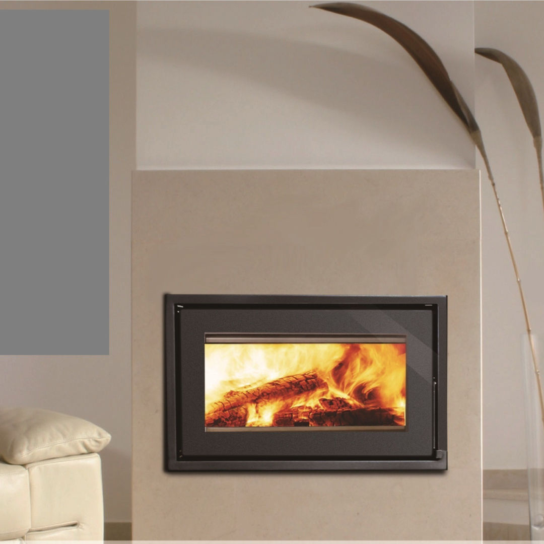 A black framed fireplace insert with visible flames, set into a beige wall with a modern design.