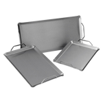 A set of three stainless steel Chad-O-Chef stir-fry pans of varying sizes with handles.