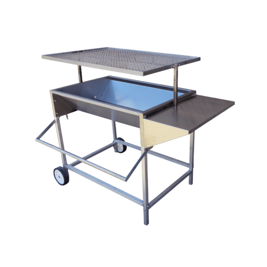 A large, adjustable stainless steel charcoal drum braai with aluminum legs, a side shelf, and wheels for mobility.