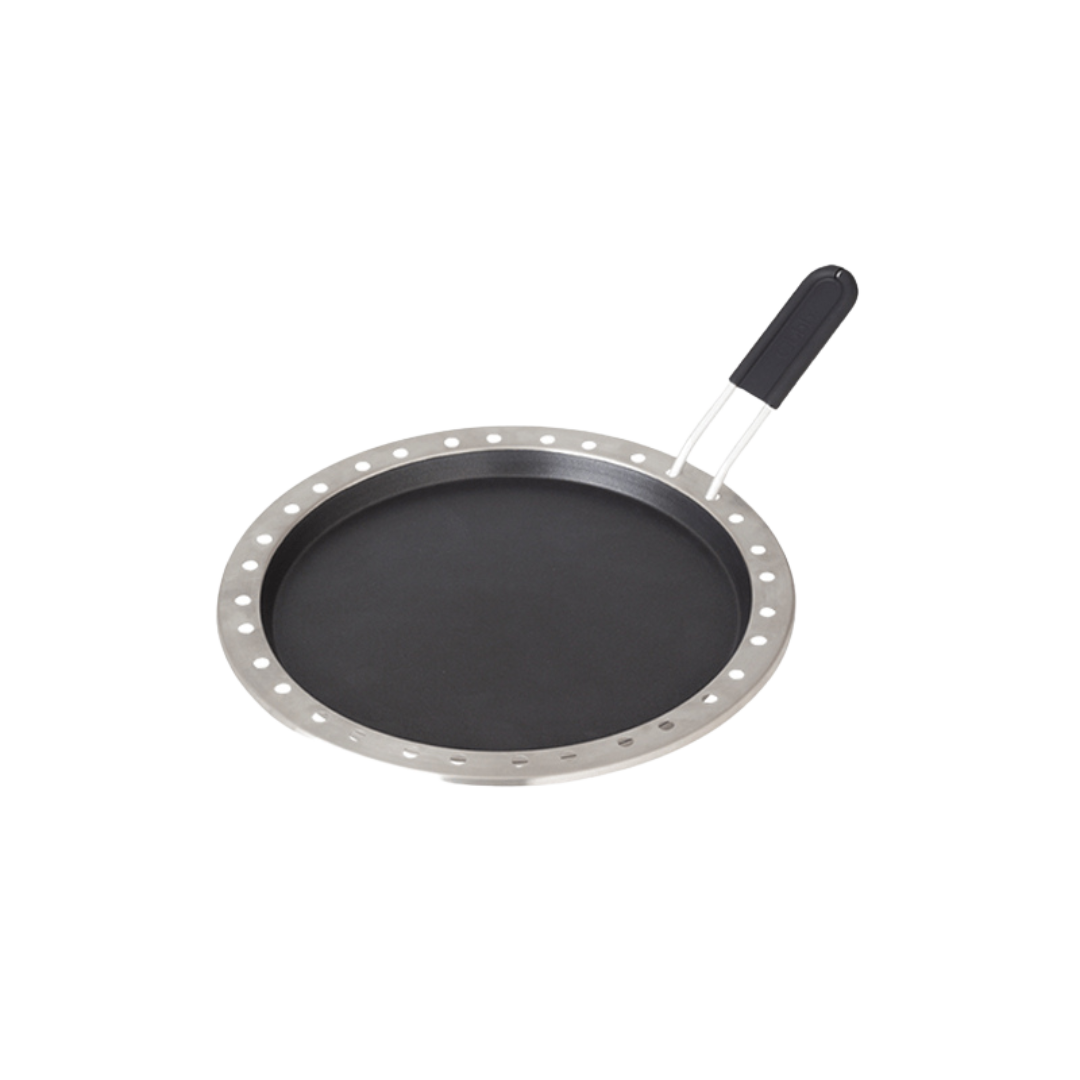 A black COBB frying pan with a lifting fork.