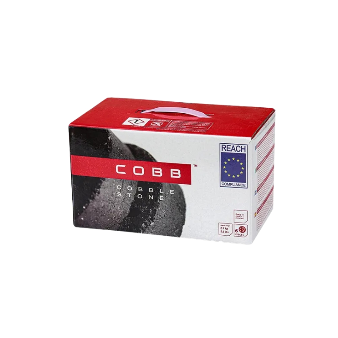 A pack of COBB brand cobblestones for outdoor grilling, with the product visible in a white and red box.