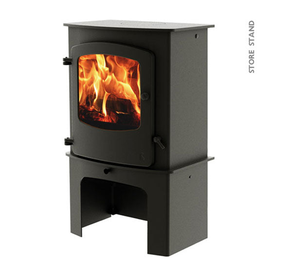 A black Charnwood Cove 2 wood stove with a visible fire through the glass door, mounted on a stand.