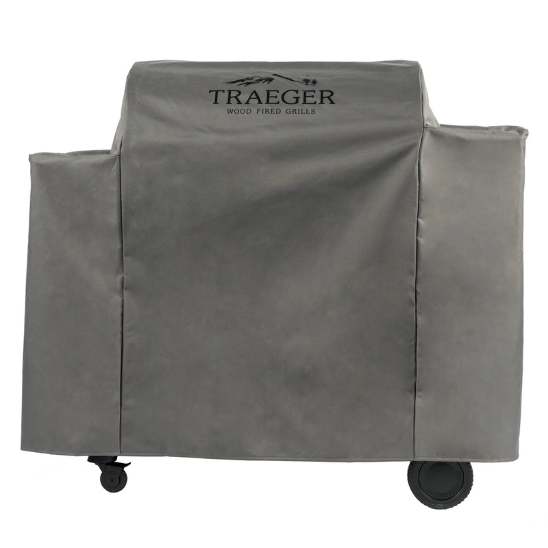 Gray grill cover with Traeger logo on a white background