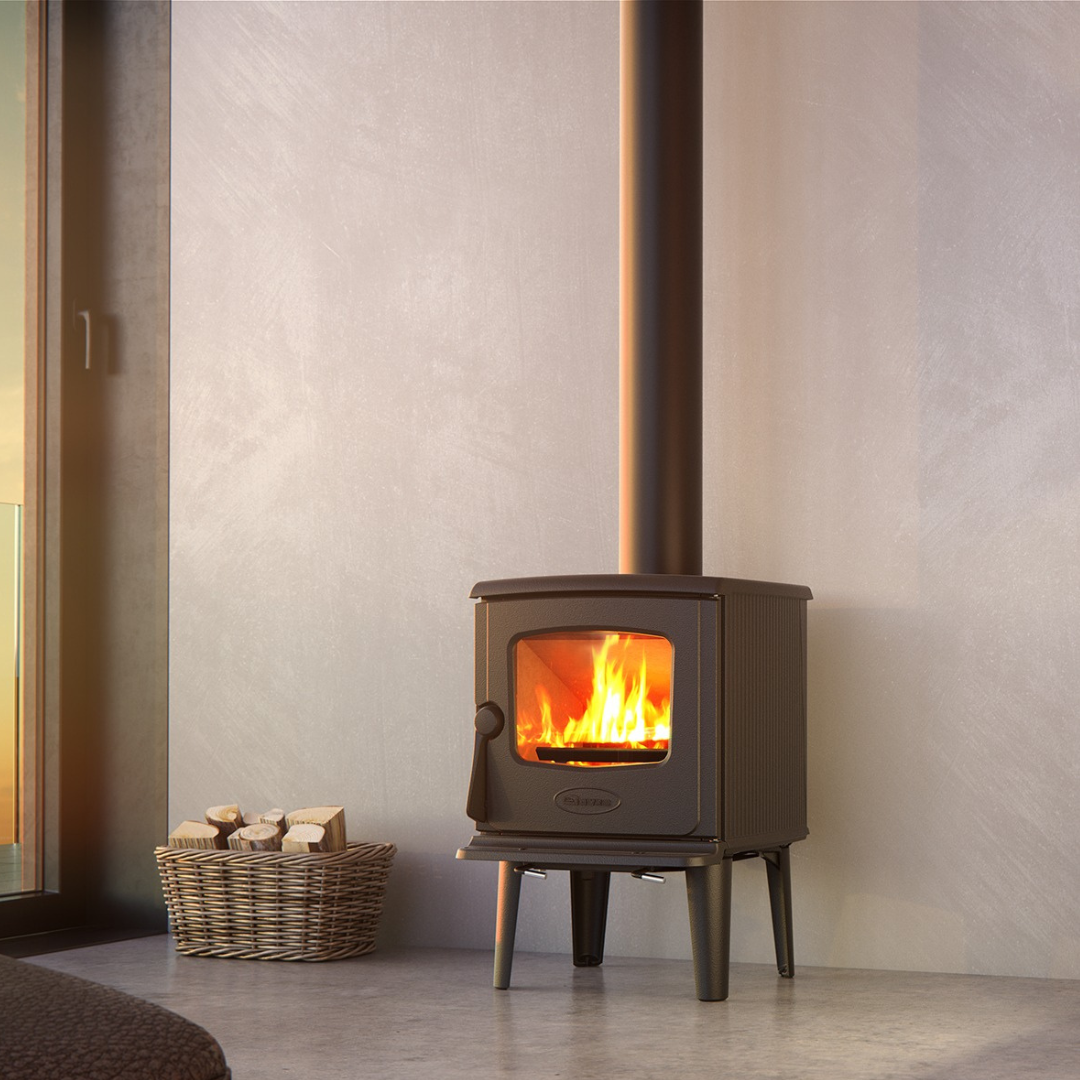 Dovre wood-burning stove, compact cast iron heater with clean burn.