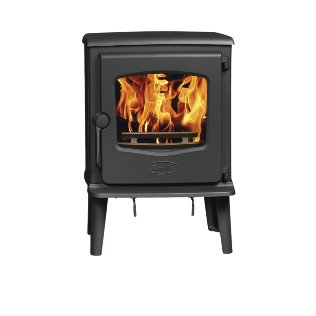 A freestanding Dovre wood-burning fireplace with visible flames behind a glass door.