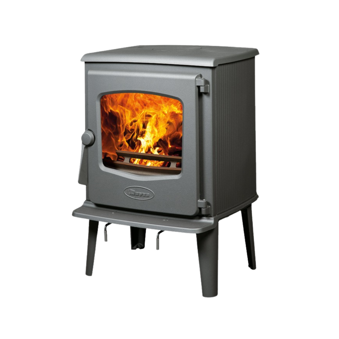 A freestanding Dovre wood-burning fireplace with visible flames behind a glass door.