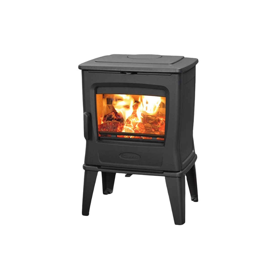 A freestanding black wood-burning fireplace with visible flames and a heat shield.
