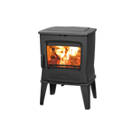 A freestanding black wood-burning fireplace with visible flames and a heat shield.