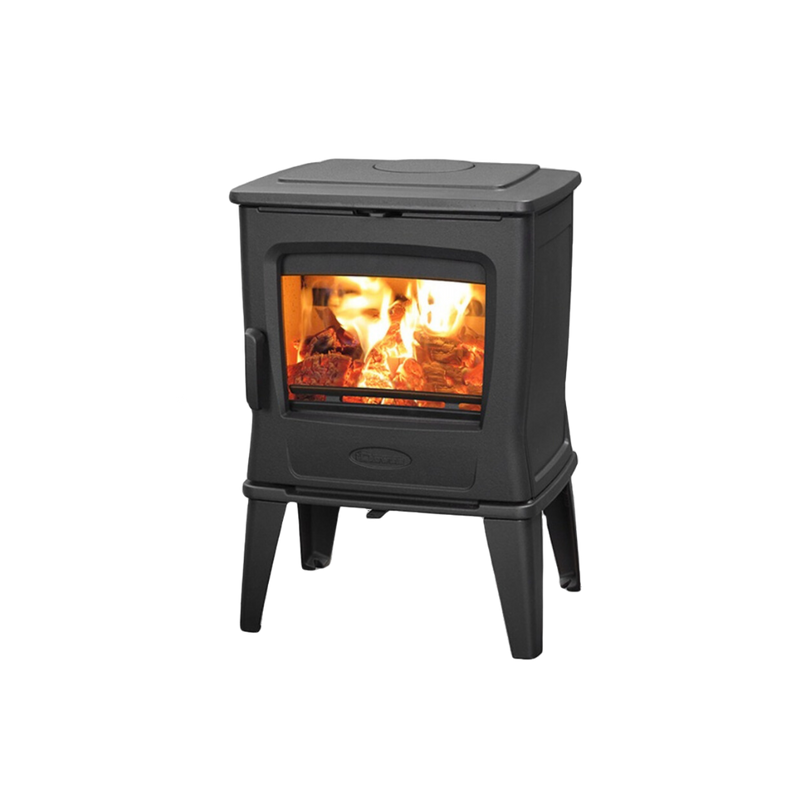 A freestanding black wood-burning fireplace with visible flames and a heat shield.