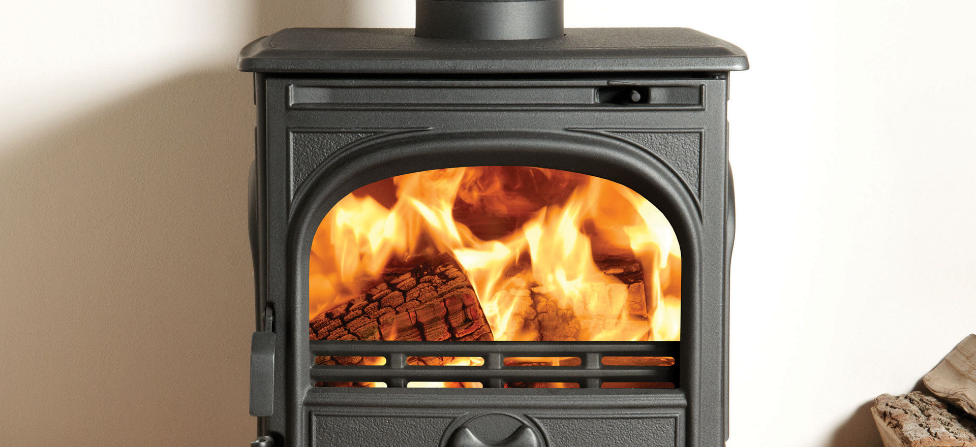 Dovre 2501 MI wood burning insert, compact cast iron firebox.