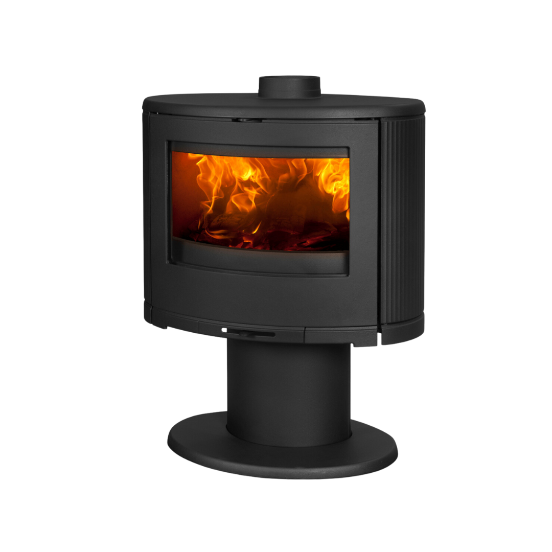 A black freestanding Dovre indoor fireplace with a visible flame through the glass door.