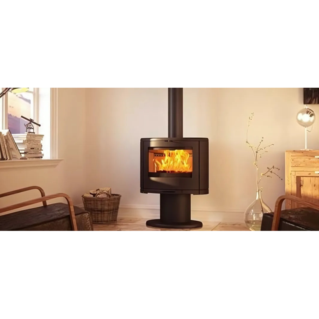 A black freestanding Dovre indoor fireplace with a visible flame through the glass door.