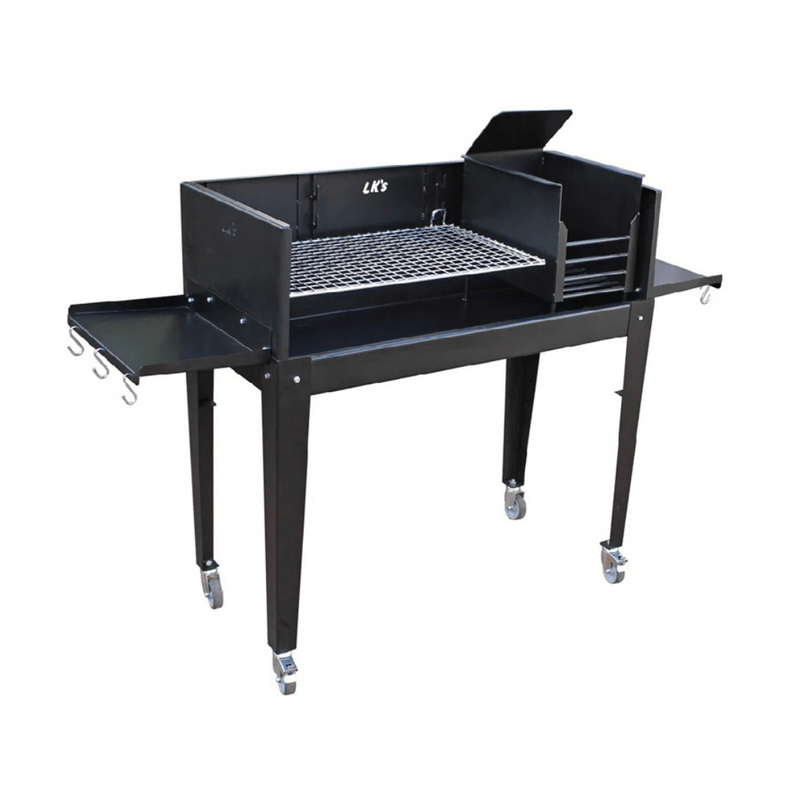 A black metal portable braai grill with a closed lid and side shelves on wheels.