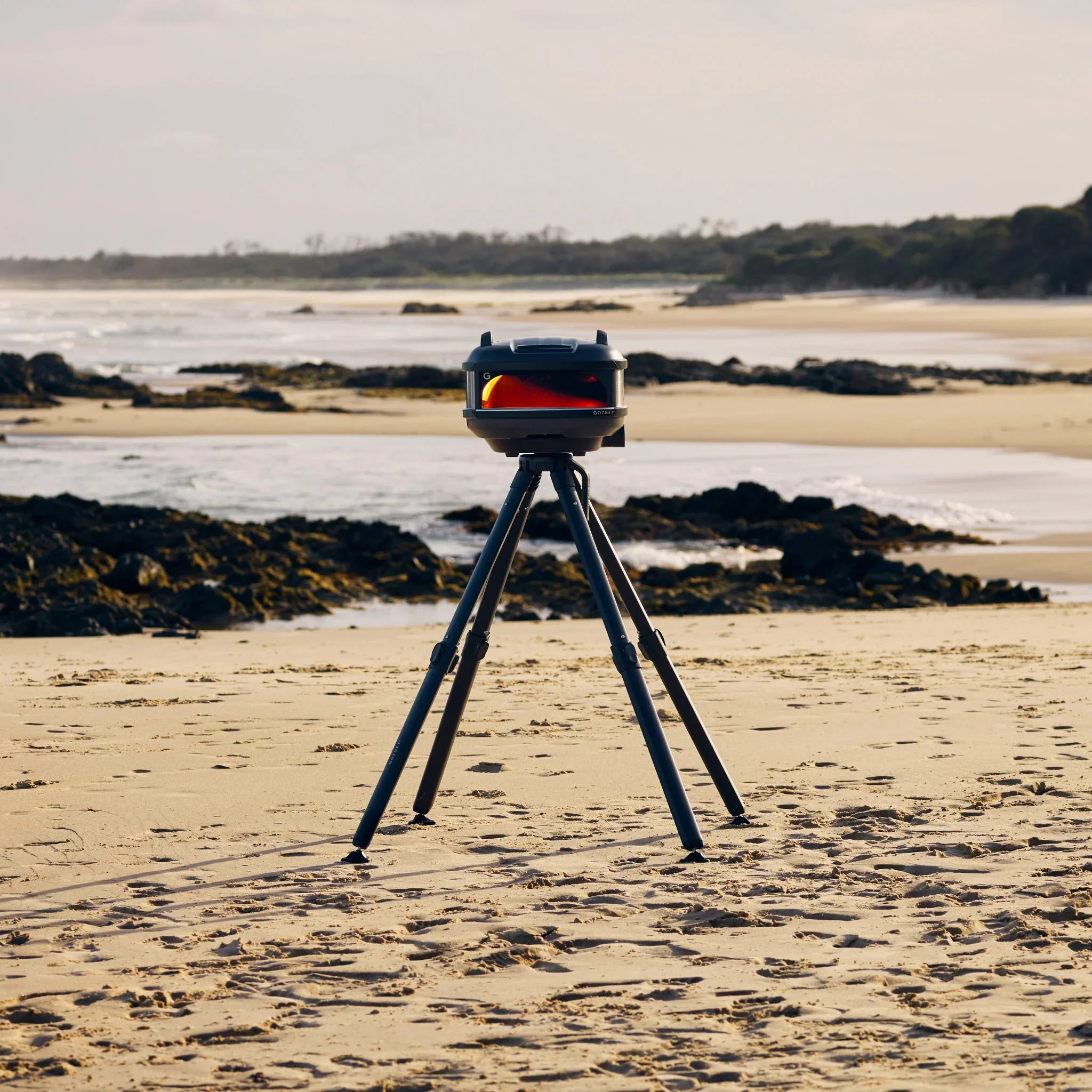 Barbecue grill on a tripod at the beach