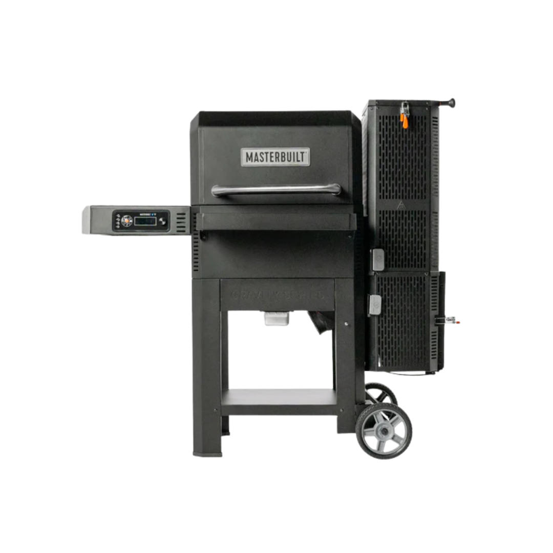 A black Masterbuilt Gravity 600 charcoal BBQ grill with digital controls, featuring a side shelf, front shelf, and a wheel for mobility.