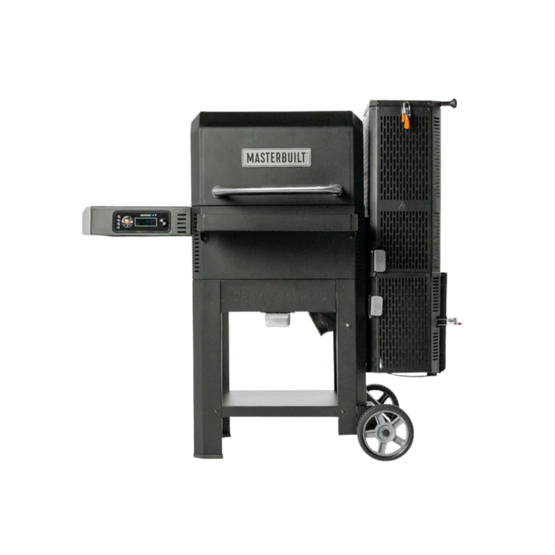 A black Masterbuilt Gravity 600 charcoal BBQ grill with digital controls, featuring a side shelf, front shelf, and a wheel for mobility.