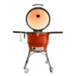 Kamado style ceramic charcoal grill with cart for smoking and searing
