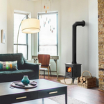 Kratki K7 cast iron wood stove lifestyle image in living room