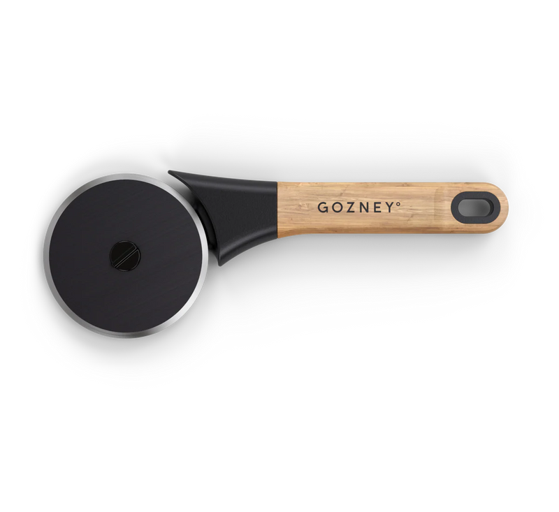Gozney pizza cutter with wooden handle on a white background