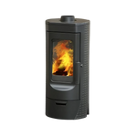 A black freestanding wood-burning fireplace with a visible fire through the glass door.