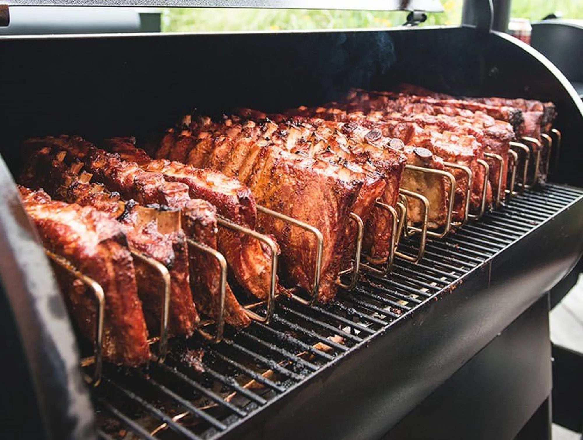 Ribs on a grill with a focus on the cooking process