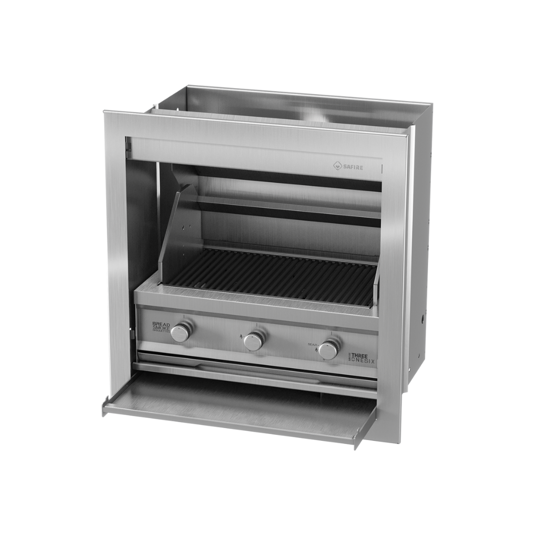 An outdoor gas braai grill with a silver finish and control knobs on the front.