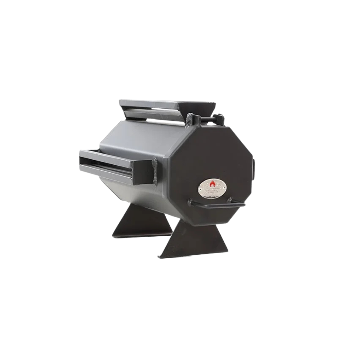 A black portable gas grill with a lid closed, set against a plain background.