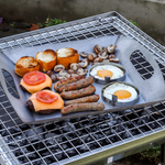 Braai pan used outdoors in lifestyle cooking scene