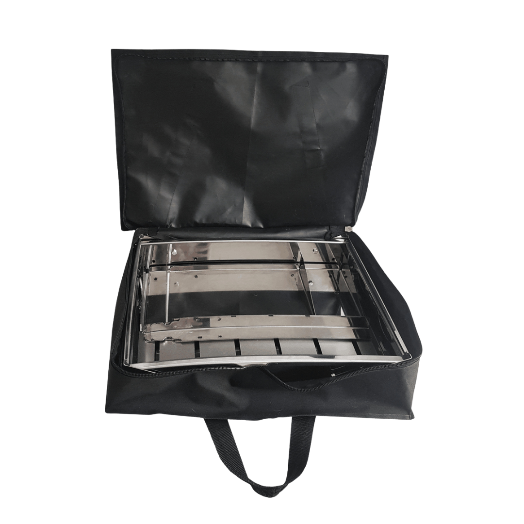 Portable camping braai with foldable legs and chrome grid, outdoor use