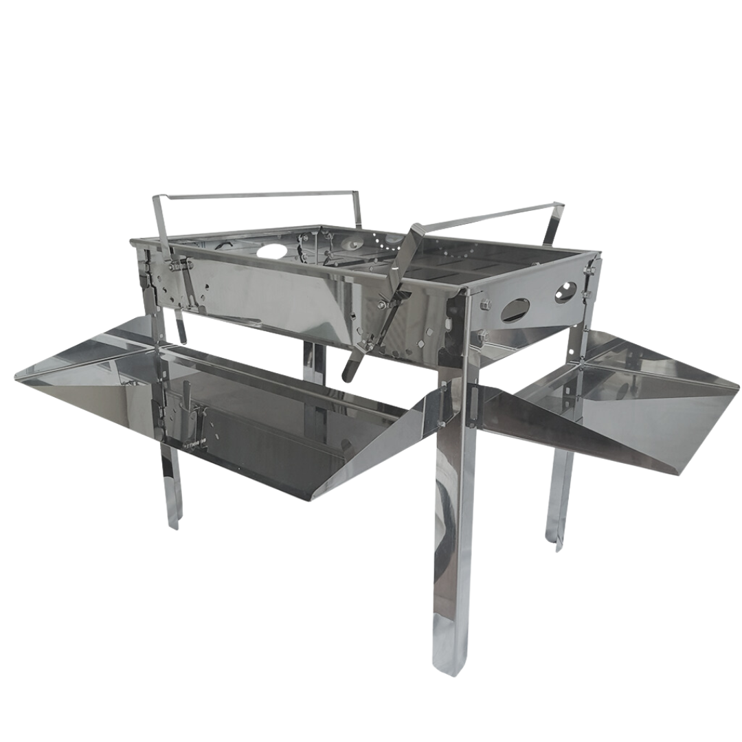 A portable stainless steel braai camping grill with removable side trays and adjustable cross arms.