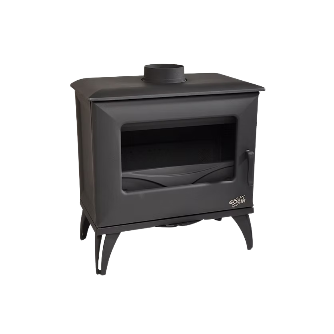 A black Godin Cube wood stove with a visible brand logo on the front, a window, and four legs.