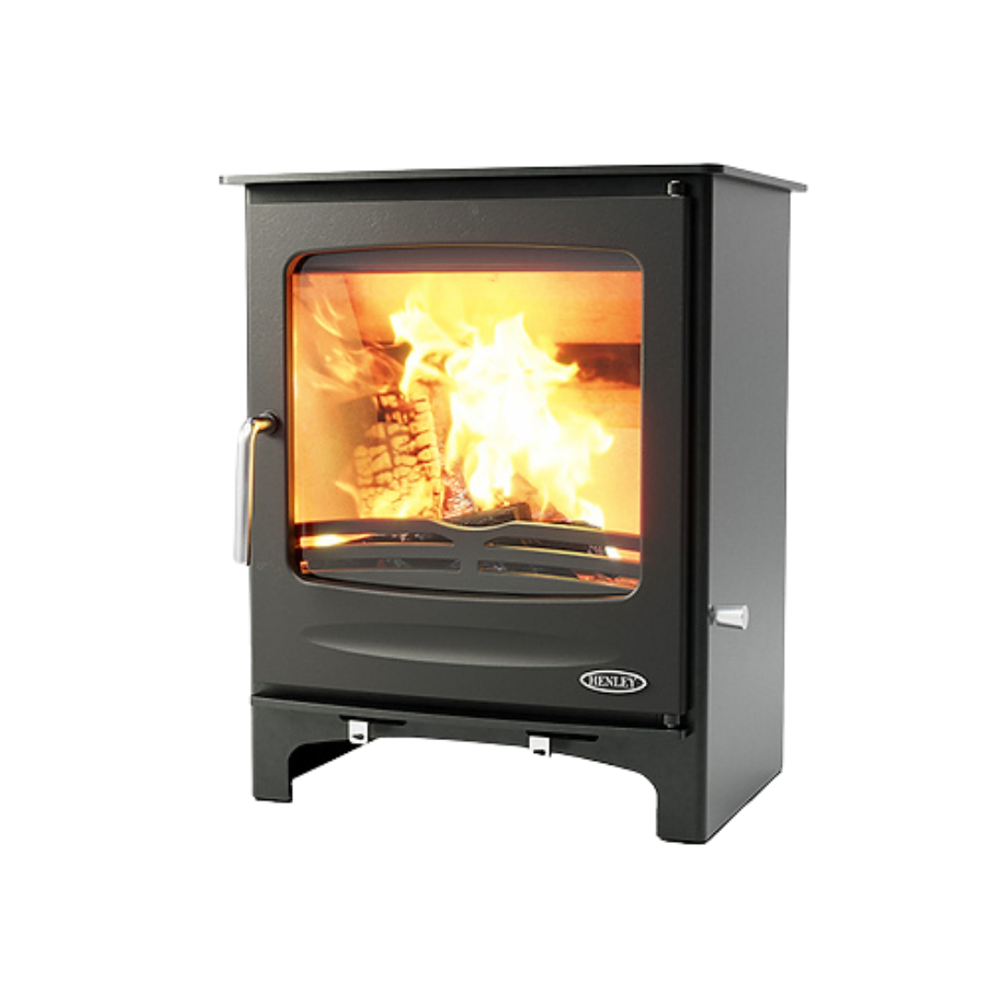 A freestanding, black multi-fuel fireplace with visible flames through the glass door.