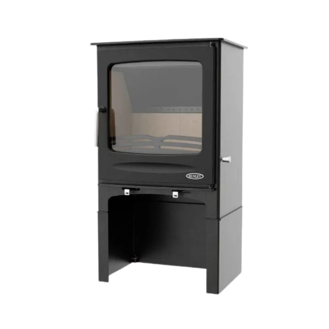 A freestanding, modern black fireplace with a visible fire through the glass door.