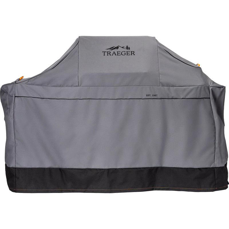 Gray grill cover with Traeger logo on a white background