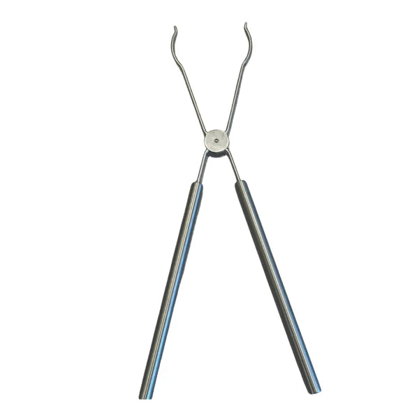 Metal tongs on a white background